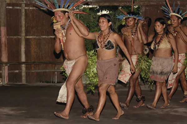 Traditional tribal dance from the Dessanos tribe with face paintings and wearing a traditional hat