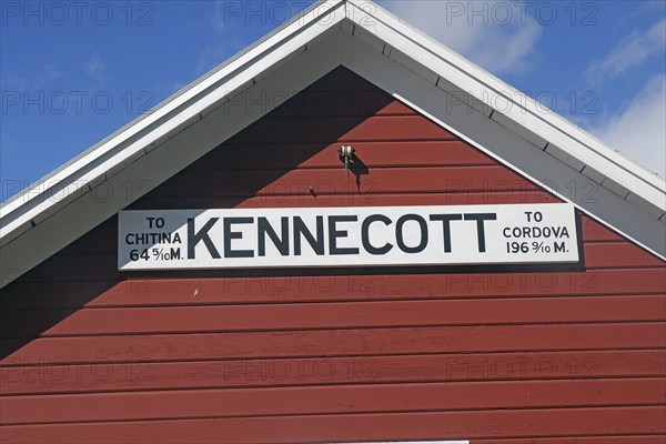 Distance in Kennecott, red wooden buildings, railway, ghost town, Unesco World Heritage