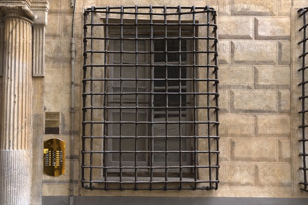 Heavy iron bars on the window of Palazzo Pinelli Parodi in the historic centre, Piazza Pinelli no.
