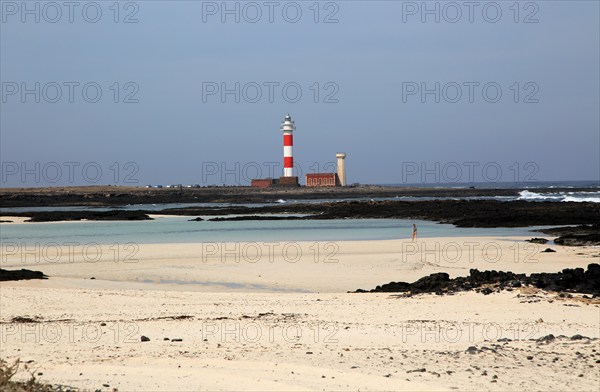 Red and white striped lighthouse, Faro de Toston, El Cotillo, Fuerteventura, Canary Islands, Spain,