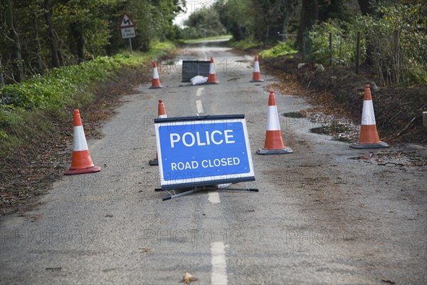 Police Road Closed sign with bollards UK Bawdsey, Suffolk, England, United Kingdom, Europe