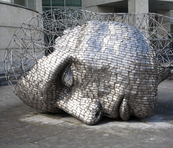 Head sculpture by artist Rick Kirby in Calne town centre, north Wiltshire, England installed in