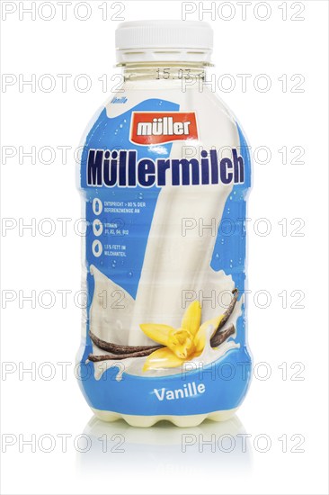 Muller's milk vanilla flavour in a Theo Müller bottle cropped against a white background