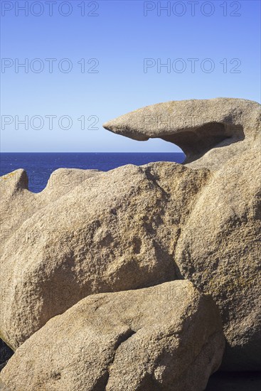 Strange rock formations and water, wind eroded boulders along the Côte de granit rose, Pink Granite