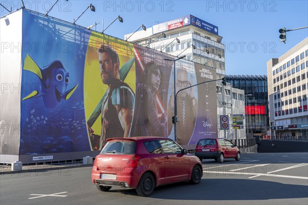 Advertising, large poster, for the new streaming service Disney Plus, in Düsseldorf