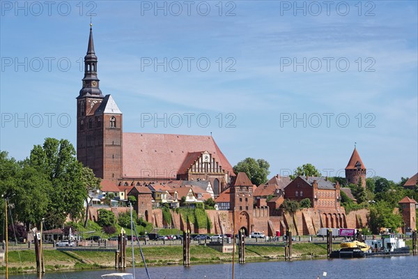 The river Tangier at the harbour of Tangermünde in front of the city wall and the old town and the