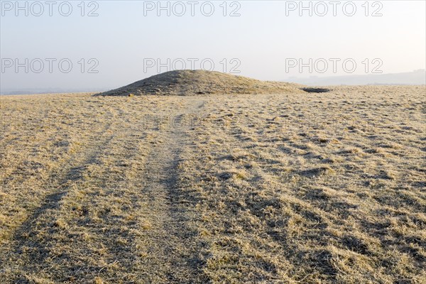 Bronze Age bowl barrow on Windmill Hill, a Neolithic causewayed enclosure, near Avebury, Wiltshire,