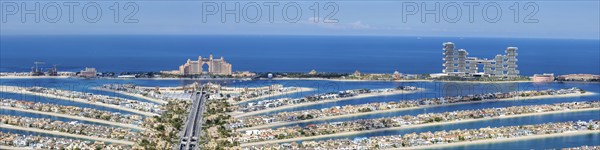 The Palm Jumeirah with Atlantis Hotels panorama artificial island from above in Dubai, United Arab