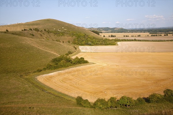 Steep chalk scarp slope and the Vale of Pewsey looking east from near Alton Barnes, Wiltshire,