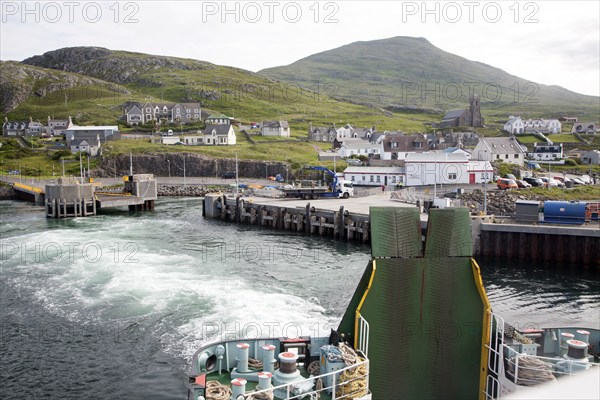 Ship's wake in water ferry leaving Castlebay, Barra, Outer Hebrides, Scotland, UK