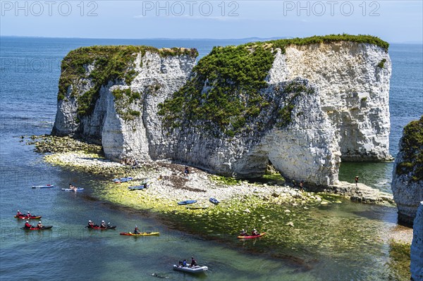 People on kayaks and paddleboards, White Cliffs. Old Harry Rocks Jurassic Coast, Dorset Coast,
