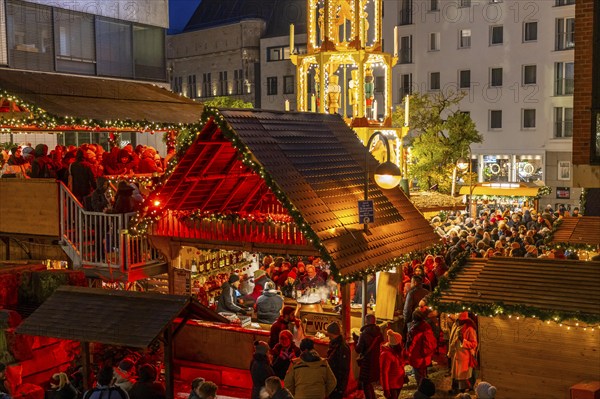 Christmas market at Roncalli Platz am Dom, in the city centre of Cologne, Sunday shopping in