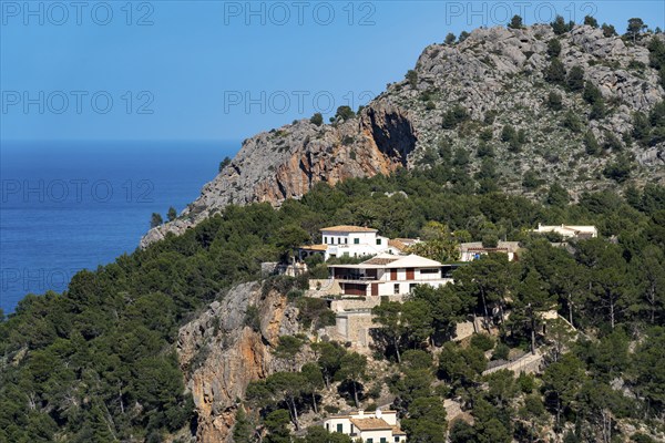 Villas on the cliffs in the north-west of the island, near Alconàsser, Serra de Tramuntana,