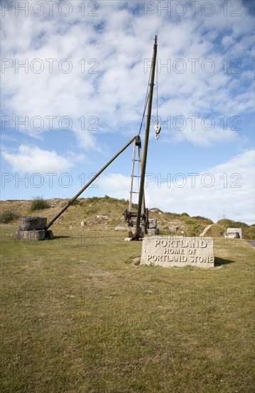 Antique crane forming monument to the quarrying heritage as the Home of Portland Stone, Isle of