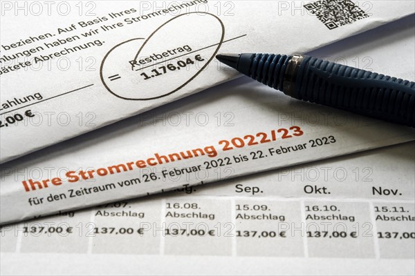 Symbolic image of electricity bill, billing of an electricity provider, additional payment due to