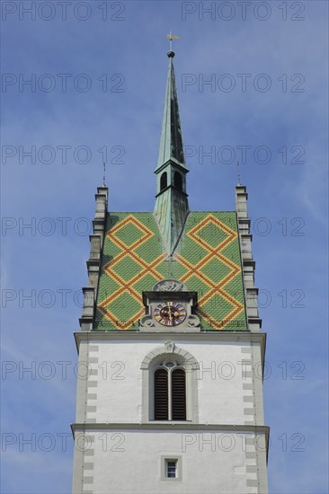 Tower of the Gothic St. Nicholas Church, spire, roof tile, pattern, clock, church tower,