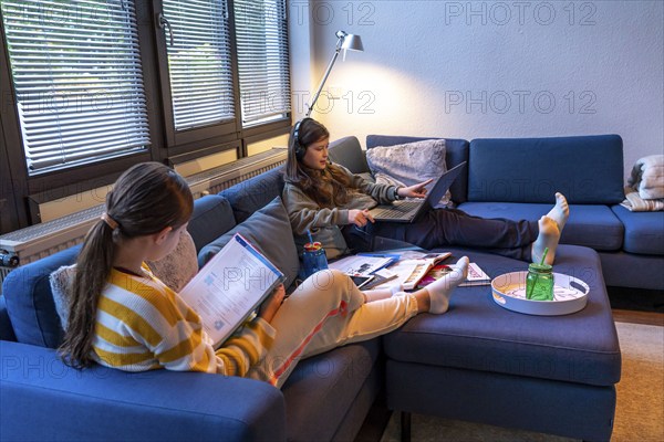 Homeschooling, 2 girls, sisters, 11 years old, learning at home, home learning, lessons at home,