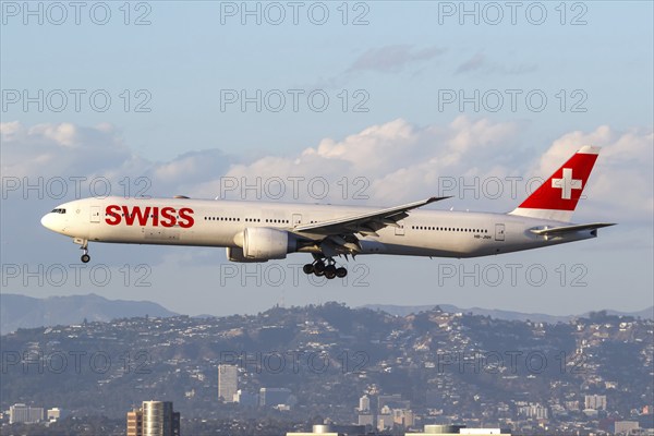 A Swiss Boeing 777-300 (ER) aircraft with the registration HB-JNH at Los Angeles Airport, USA,