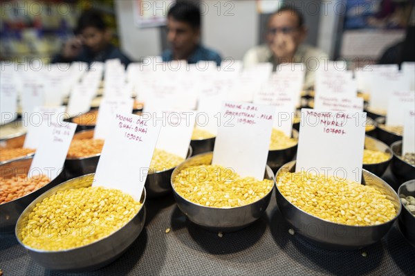 Samples of pulses kept on display inside a shop at a wholesale market ahead of the presentation of