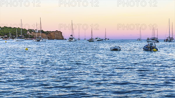 Sailing yachts at the blue hour in the bay of Talamanca, Eivissa, Ibiza Town, Ibiza, Balearic
