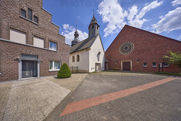 St Mauritius Church and residential building in the Hausdülmen district, Dülmen, Münsterland,
