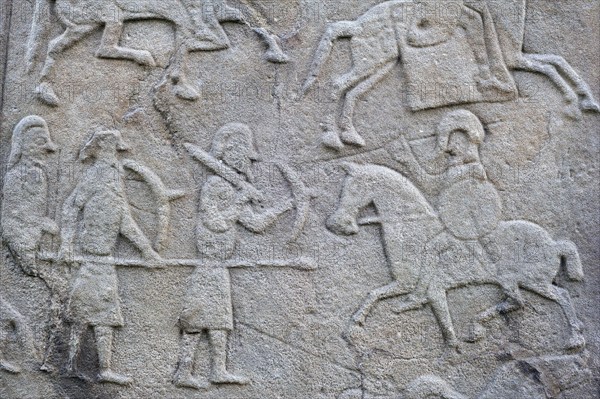 Detail of battle scene on the rear of the Aberlemno Kirkyard Cross Slab, a Pictish stone in