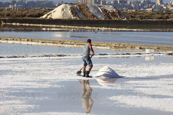 Workers in the salt pans of Trapani, Sicily, Italy, Europe