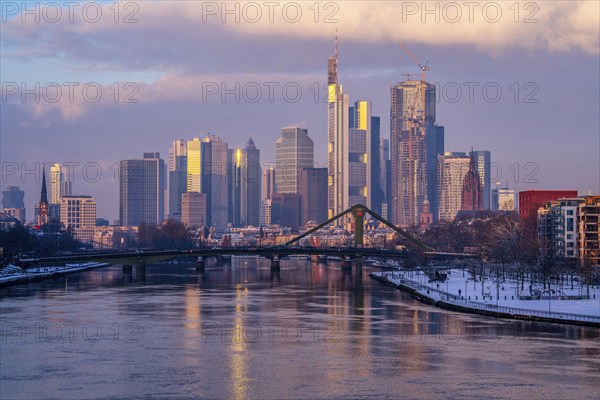 The skyline of Frankfurt am Main, skyscrapers of the banking district, Flößerbrücke, wintry