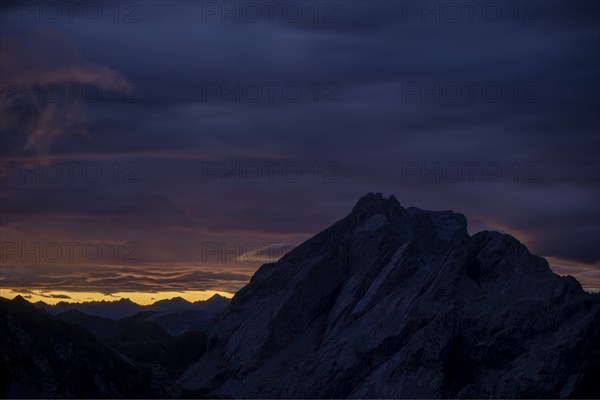 Montafon mountains with dramatic cloudy sky at sunrise, Tschagguns, Rätikon, Montafon, Vorarlberg,
