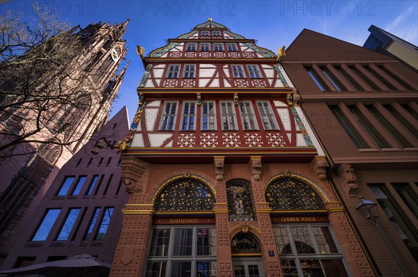 Goldene Waage coffee house, reconstructed Renaissance half-timbered house, next to St Bartholomew's