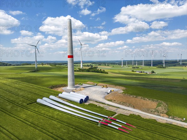 Wind farm near Brilon-Radlinghausen, new wind turbine being built, tower elements and rotors ready