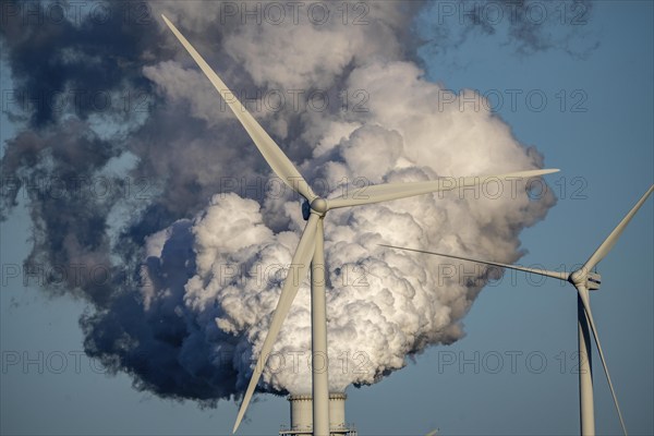 Chimneys, smoke plume of the RWE coal-fired power plant Eemshavencentrale, wind power plant, in the