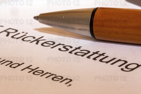 Symbolic image Application for reimbursement: close-up of a cover letter