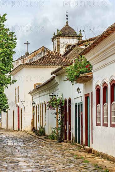 Typical street in the historic city of Paraty with its houses and stone pavement, Paraty, Rio de