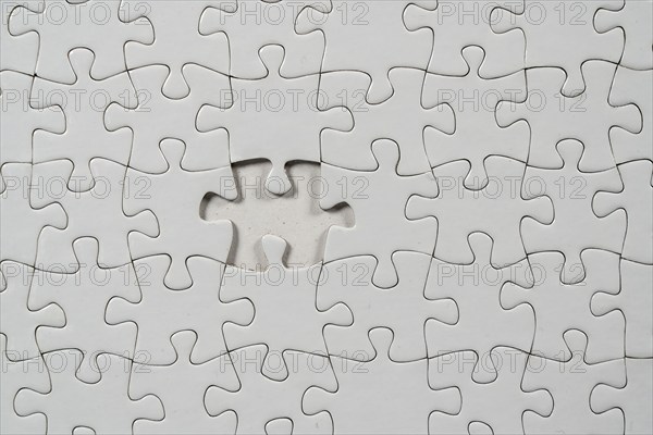 Puzzle game, blank, white, without motif, for printing, one piece missing