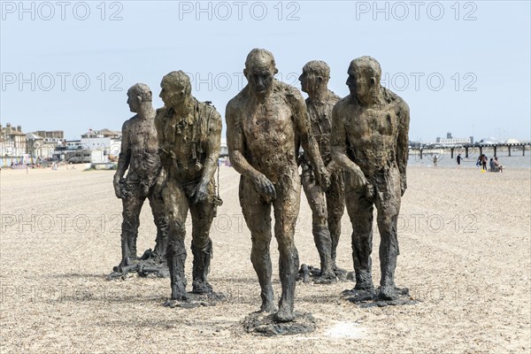 'Walking Men' artwork bronze sculptures by Laurence Edwards, South Beach, Lowestoft, Suffolk,