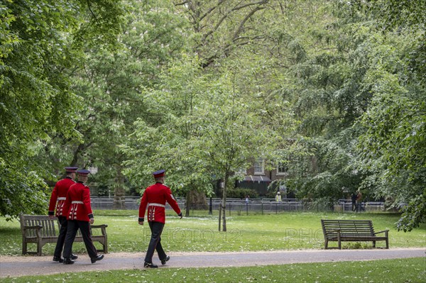 Soldiers in red and black uniform, Green Park, London, England, Great Britain