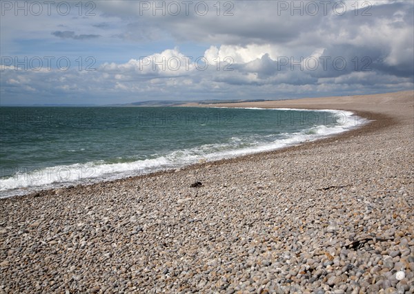 Sweeping bay and shingle beach of Chesil Beach from Chiswell, Isle of Portland, Dorset, England, UK