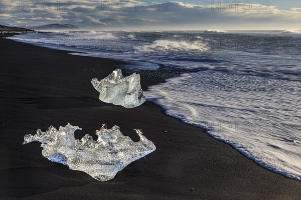 Ice floes on the beach, waves, sunny, morning mood, winter, Diamond Beach, Breidamerkursandur,