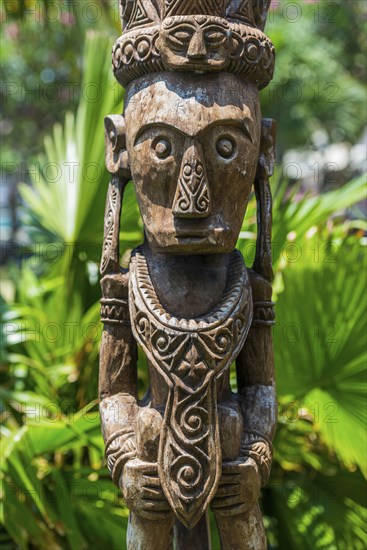 Statue of a native, sculpture, figure, totem, sculpture, religion, tree, wood, art, architecture,