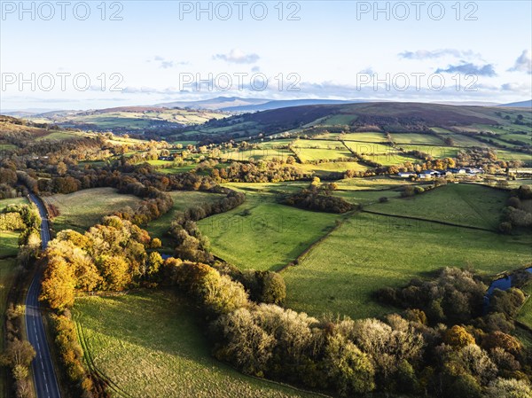 Farms over Trecastle from a drone at sunset, Brecon Beacons National Park, Powys, Wales, England,