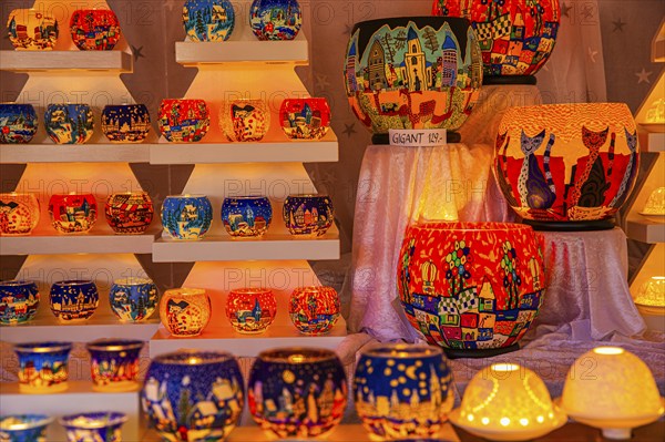 Colourful tea lights in a stall at the Christmas market at City Hall, Vienna, Austria, Europe