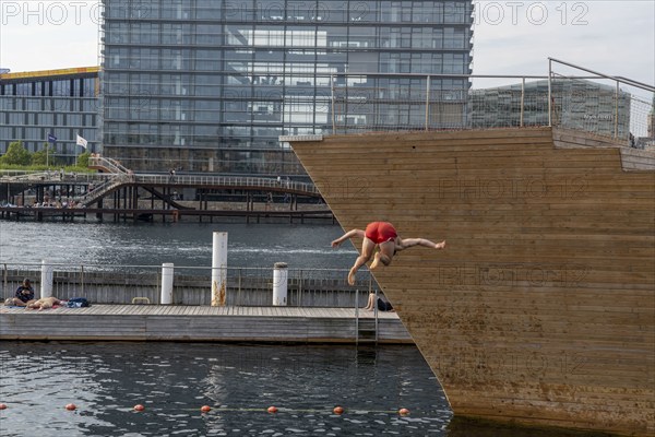 Summer, swimming in the harbour of Copenhagen, there are official bathing places, harbour baths and