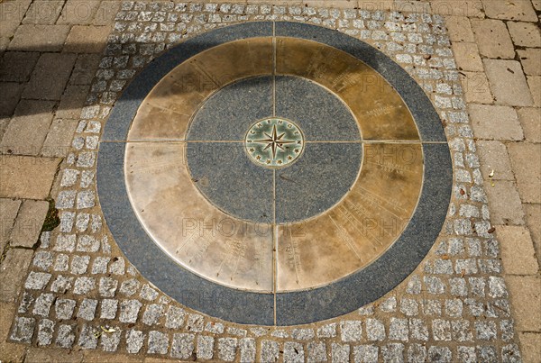 Compass rose mosaic in the ground, surrounded by cobblestones, Schengen, Canton of Remich, Grand