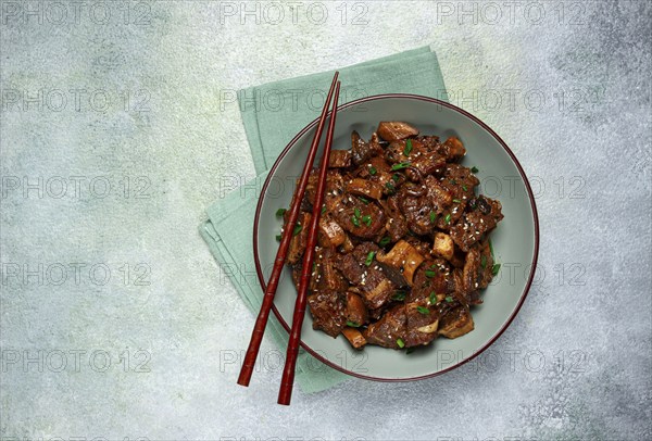 Bulgogi, with mushrooms, with sesame seeds and green onions, Korean cuisine, homemade, no people