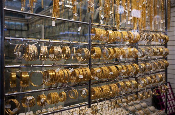 Gold in shop window, display, offer, wedding jewellery, gold souq, market, Deira, Dubai, United