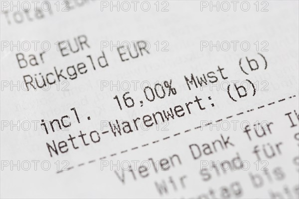 Close-up of a till receipt showing the reduction in VAT to sixteen per cent in Germany due to the