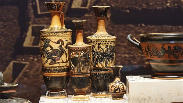 Greek ceramic vases with ornamental patterns in a museum, Archaeological Museum, Archea Korinthos,