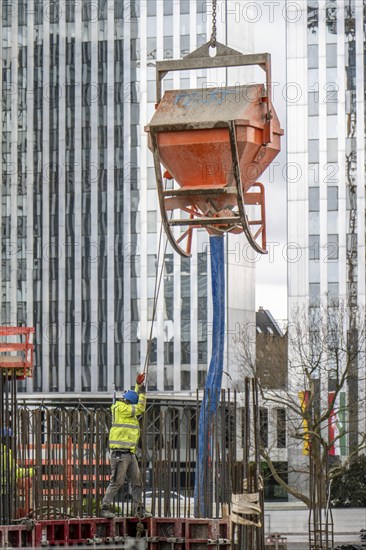 Concrete works, concrete bomb, on a large construction site, construction of a residential and