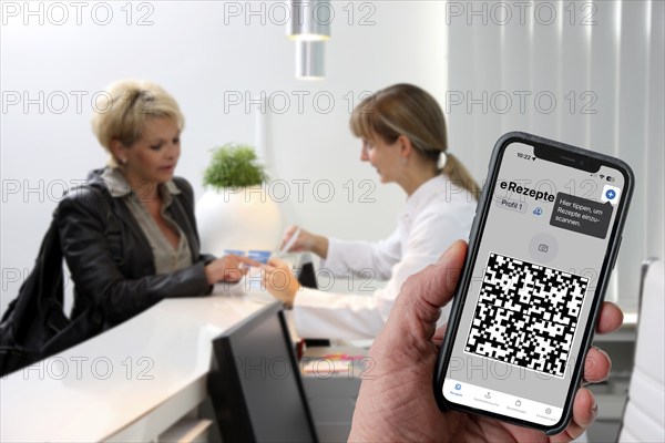 Symbolic image of an e-prescription, prescription issued by a doctor, with QR code, is scanned